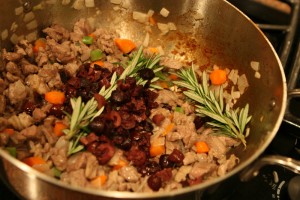 mirepoix, olives, lamb, spices